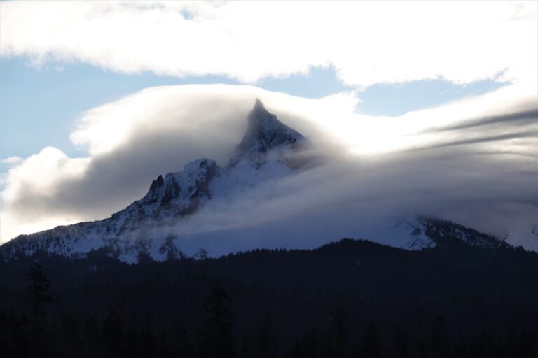 Mount Theilsen wrapped in a cloud blanket.